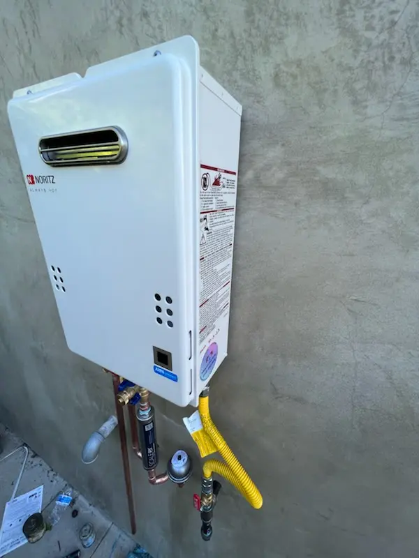 Tankless water heater installation for Welles Village homes